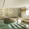 Indoor pool of private villa with wetlands mural